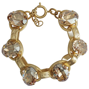 Catherine Popesco 14k Gold Plated Crystal Oval Scroll Link Bracelet, 7" 1609G Champagne